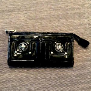 Marc by Marc Jacob’s Black Patent Leather clutch/ wallet bag.